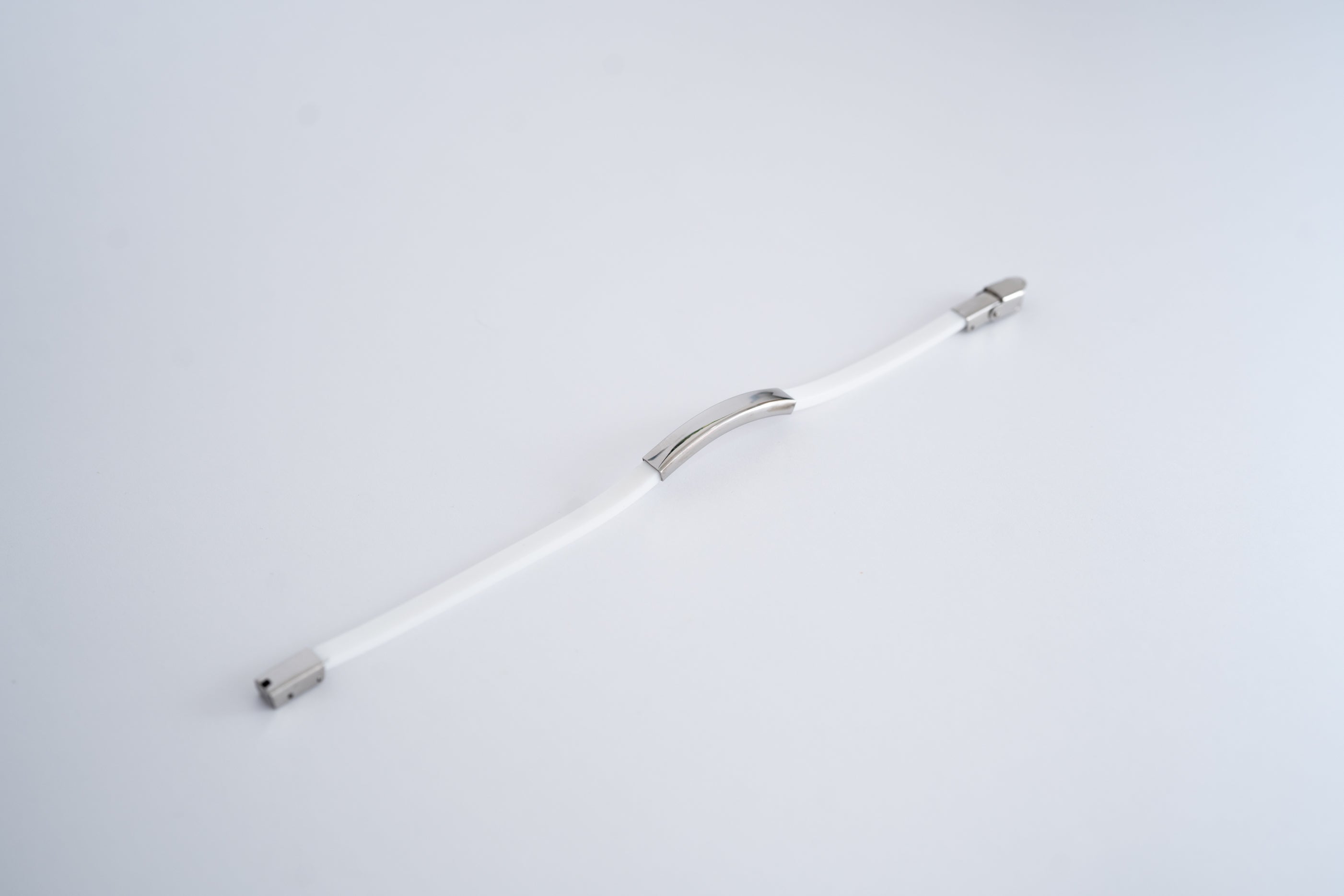 Bracciale in gomma con placchetta in acciaio Multicolor