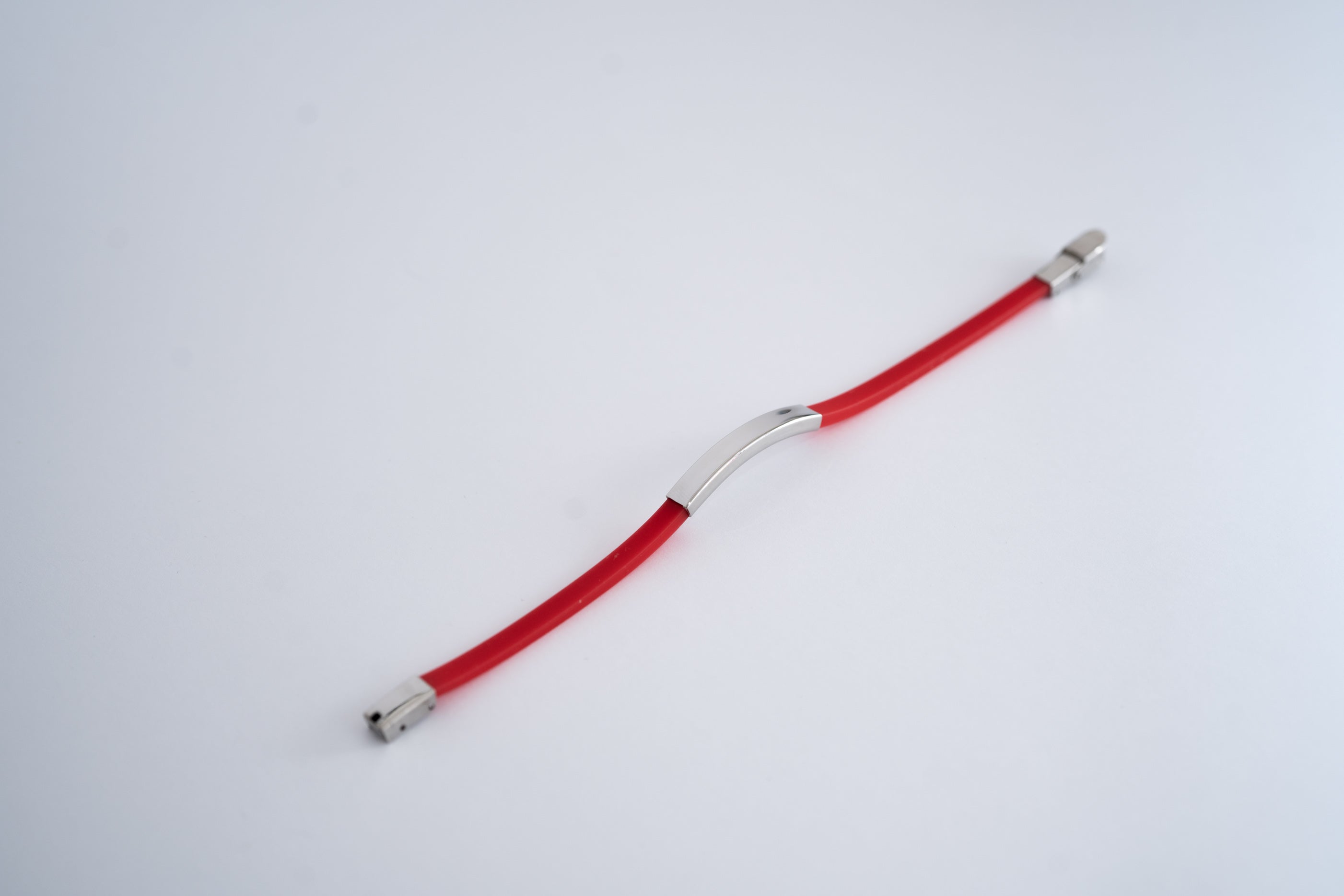 Bracciale in gomma con placchetta in acciaio Multicolor