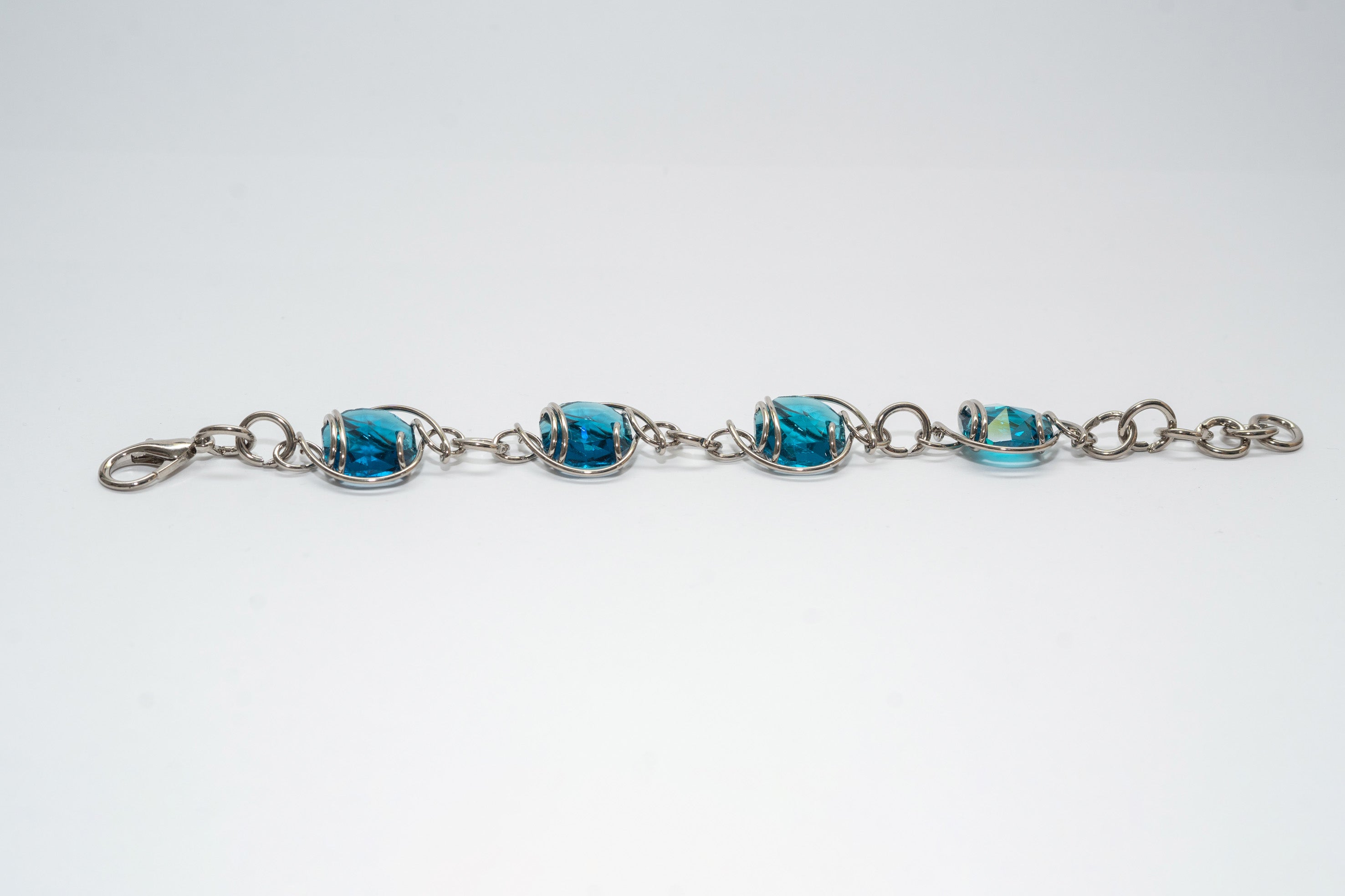 Bracciale Rodiato con 4 Cristalli blu