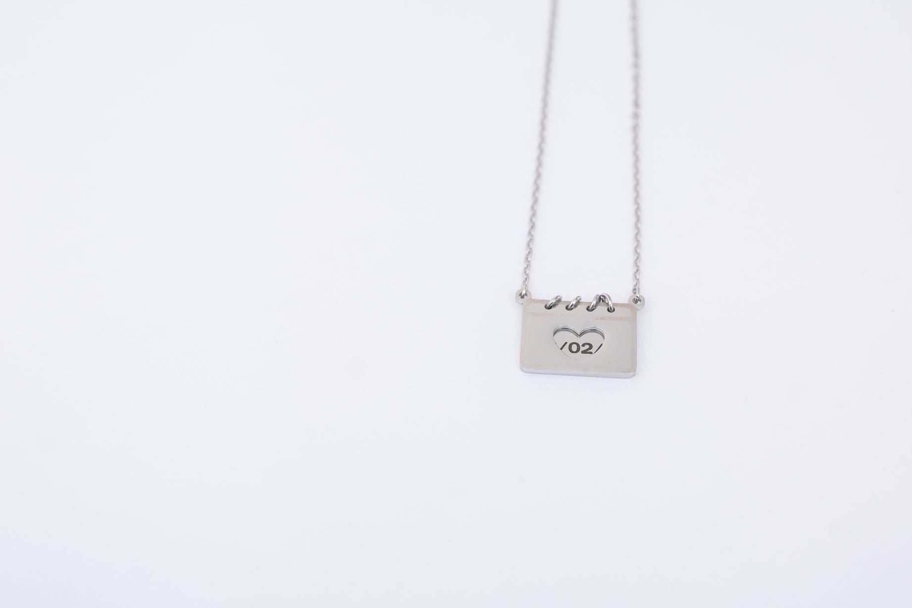 Personalized calendar necklace