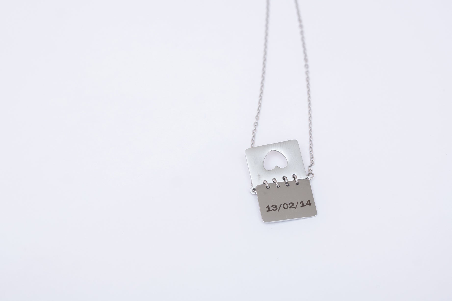 Personalized calendar necklace